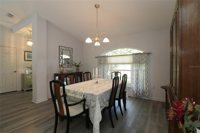 dining space featuring visible vents, baseboards, a notable chandelier, and dark wood-style floors