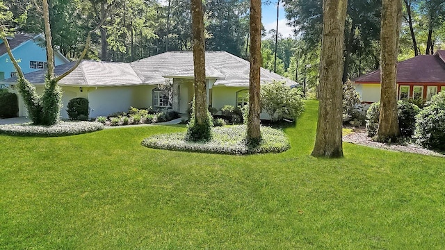 9129 SW 193rd Cir, Dunnellon, FL 34432 - single story home featuring stucco siding and a front yard