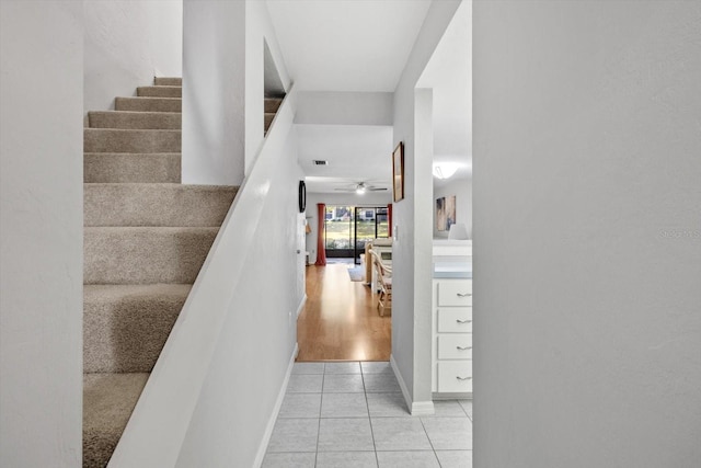 340 E Glassboro Ct Unit 4B, Hernando, FL 34442 - stairs with tile patterned flooring, baseboards, and a ceiling fan