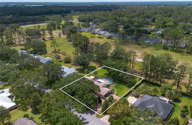 birds eye view of property with a residential view