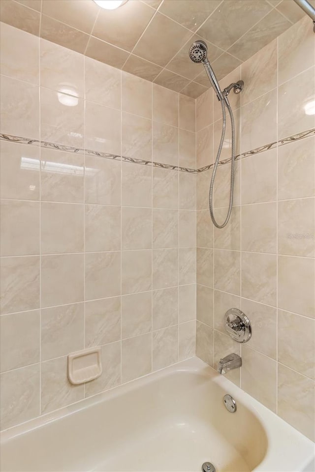 full bath featuring shower / washtub combination