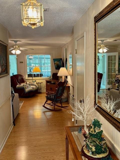 4145 SE 3rd St, Ocala, FL 34471 - hall featuring a textured ceiling and wood finished floors
