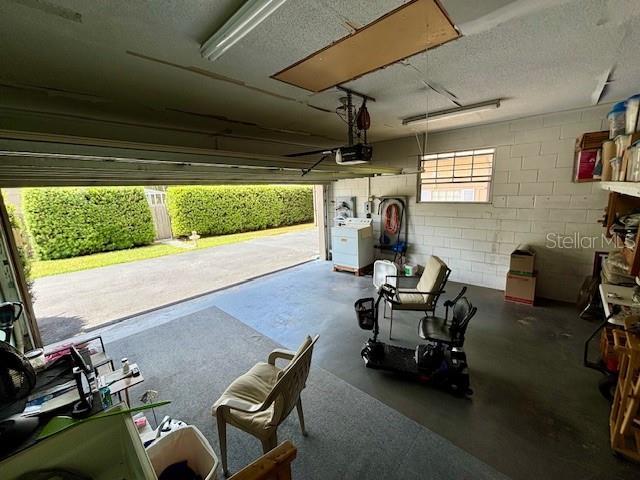 4145 SE 3rd St, Ocala, FL 34471 - garage featuring concrete block wall