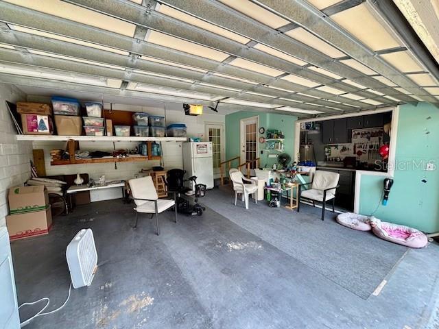 4145 SE 3rd St, Ocala, FL 34471 - garage with freestanding refrigerator