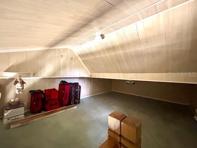 4145 SE 3rd St, Ocala, FL 34471 - additional living space with wooden walls, vaulted ceiling, and wooden ceiling