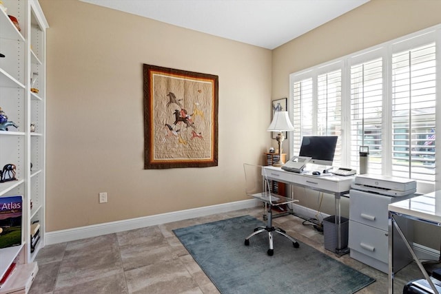 office space featuring baseboards