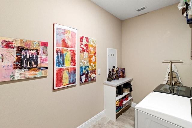 laundry room with washer and dryer, laundry area, baseboards, light tile patterned floors, and visible vents