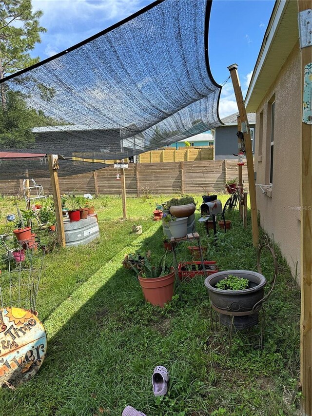 view of yard with fence