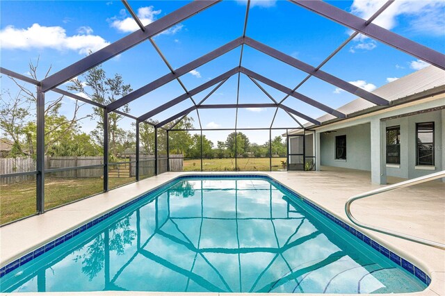 6045 SE 99th Pl, Belleview, FL 34420 - view of pool with a lawn, a patio, a fenced in pool, and fence