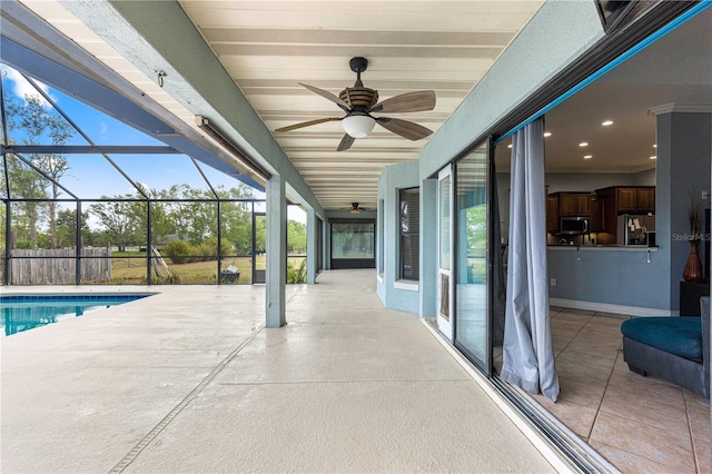6045 SE 99th Pl, Belleview, FL 34420 - view of patio featuring ceiling fan, a lanai, and an outdoor pool