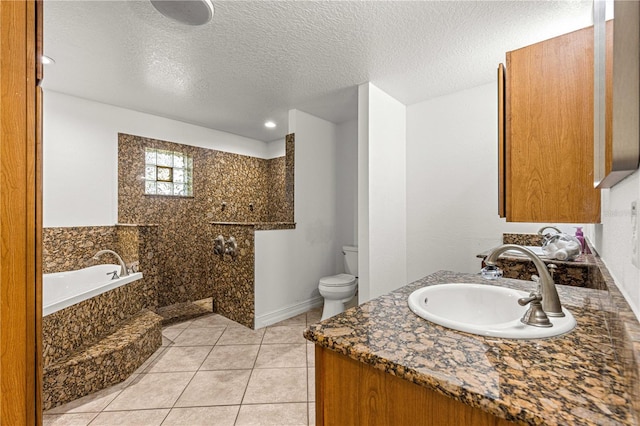 6045 SE 99th Pl, Belleview, FL 34420 - full bathroom with a textured ceiling, tile patterned floors, toilet, and a bath