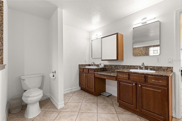 6045 SE 99th Pl, Belleview, FL 34420 - bathroom featuring a sink, a textured ceiling, toilet, and double vanity