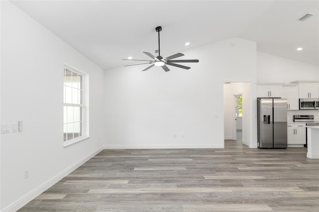 unfurnished living room featuring light wood finished floors, a ceiling fan, recessed lighting, and visible vents