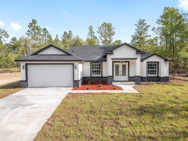 ranch-style house with an attached garage, stone siding, stucco siding, french doors, and driveway