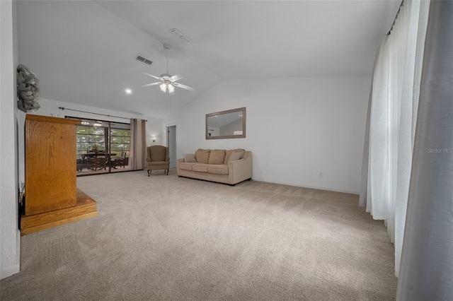 carpeted living area with ceiling fan, visible vents, and lofted ceiling