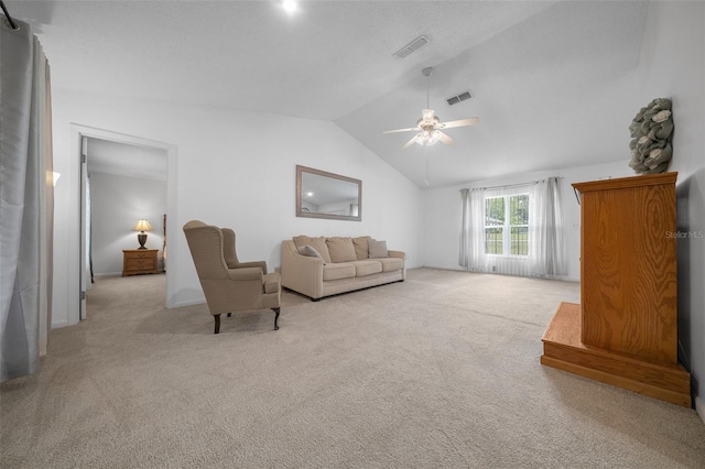 carpeted living area featuring a ceiling fan, vaulted ceiling, and visible vents