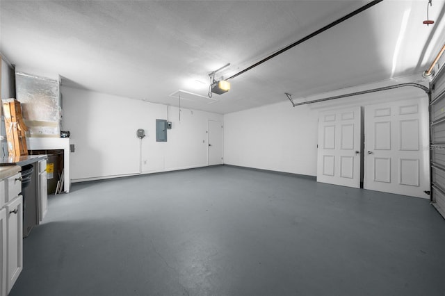 garage with a garage door opener and electric panel
