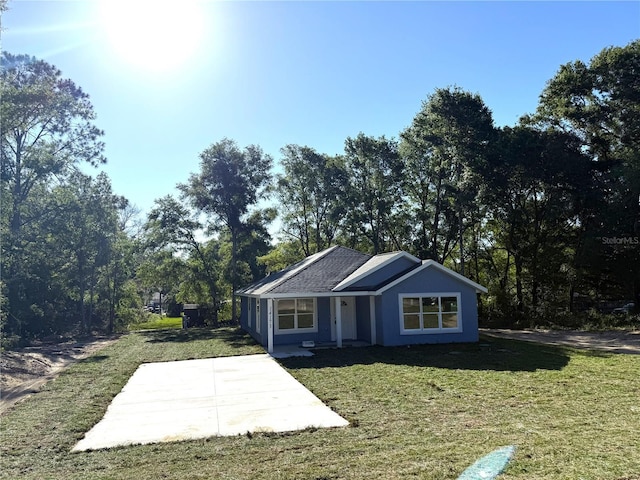 14173 SE 41st Ter, Summerfield, FL 34491 - view of outbuilding with view of wooded area
