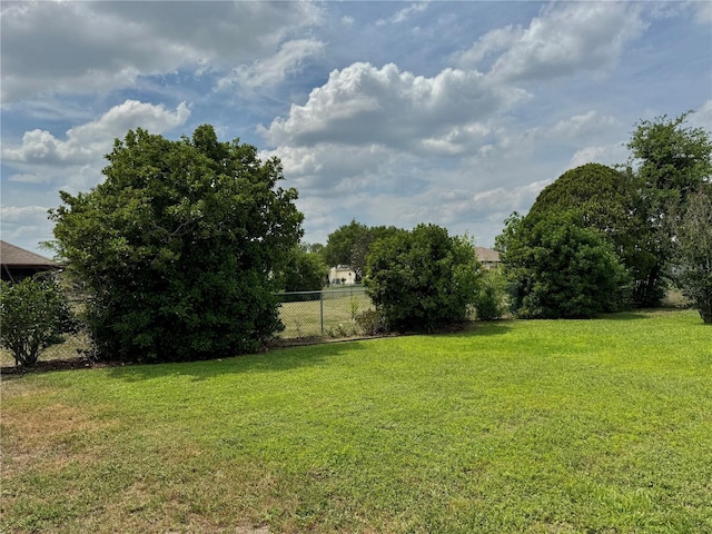 view of yard with fence