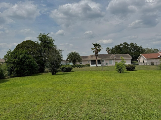 view of yard with fence