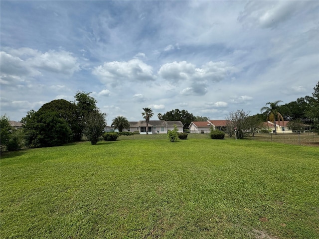 view of yard with fence