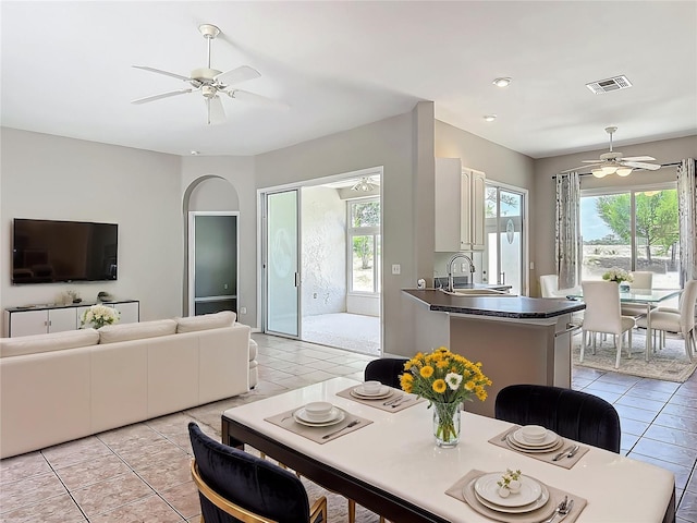 dining area with a ceiling fan, visible vents, light tile patterned floors, and recessed lighting