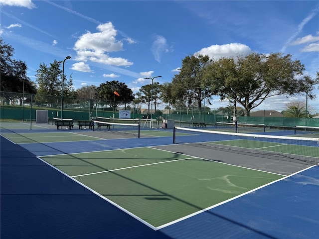 view of sport court with fence and community basketball court