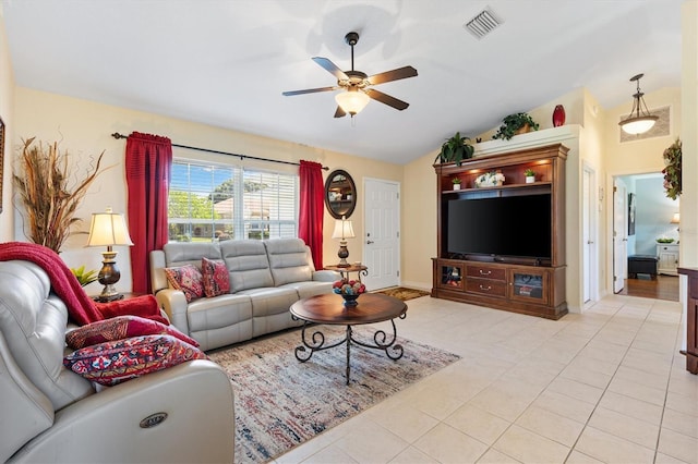 12147 SE 173rd Pl, Summerfield, FL 34491 - living area featuring ceiling fan, visible vents, baseboards, lofted ceiling, and light tile patterned flooring
