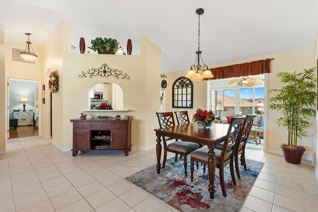 12147 SE 173rd Pl, Summerfield, FL 34491 - dining room featuring baseboards, high vaulted ceiling, and light tile patterned floors