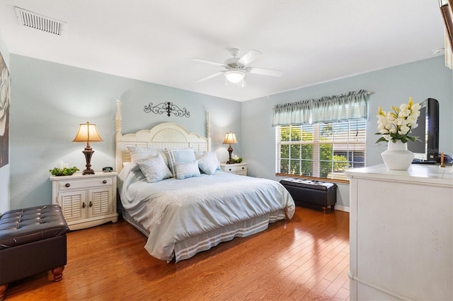 12147 SE 173rd Pl, Summerfield, FL 34491 - bedroom with visible vents, ceiling fan, and wood finished floors