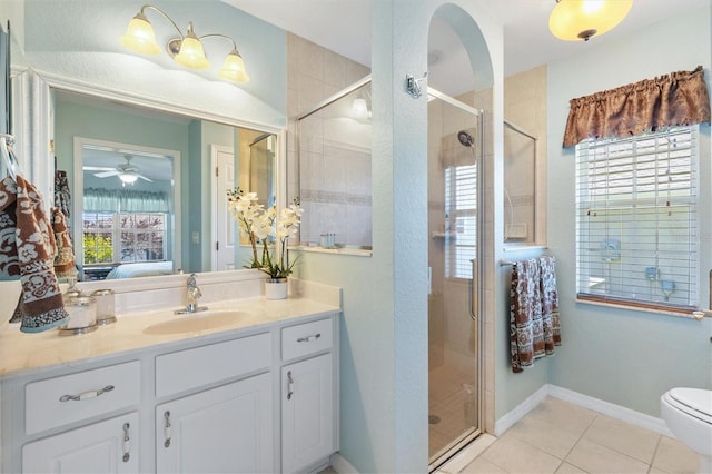 12147 SE 173rd Pl, Summerfield, FL 34491 - ensuite bathroom featuring tile patterned flooring, a stall shower, vanity, toilet, and ensuite bath