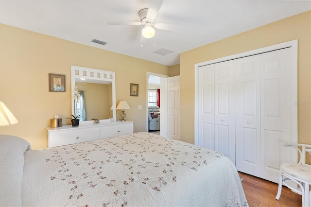 12147 SE 173rd Pl, Summerfield, FL 34491 - bedroom featuring a closet, a ceiling fan, visible vents, and light wood-style floors