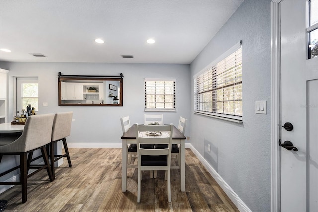 3250 SW 46th Ave, Ocala, FL 34474 - dining area with visible vents, recessed lighting, and wood finished floors