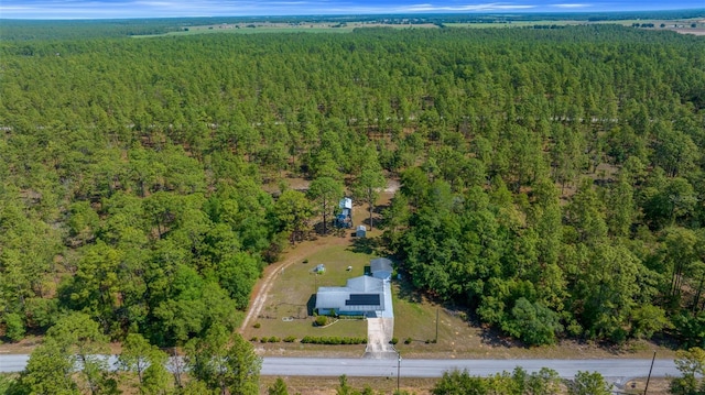 23737 NW Mallard Ave, Dunnellon, FL 34431 - aerial view featuring a wooded view