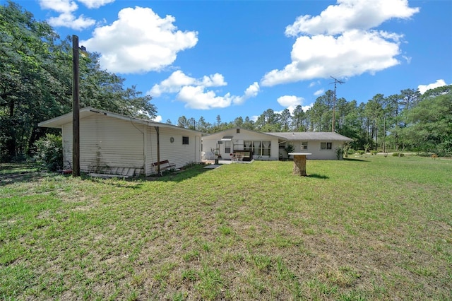 23737 NW Mallard Ave, Dunnellon, FL 34431 - back of property featuring a lawn