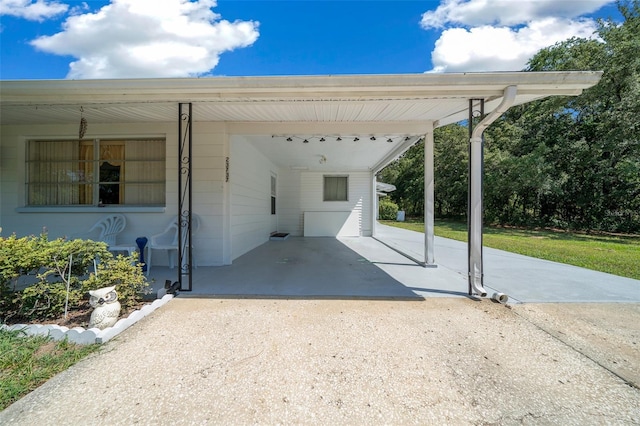 23737 NW Mallard Ave, Dunnellon, FL 34431 - view of patio / terrace with concrete driveway and a carport