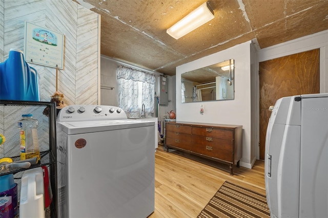 23737 NW Mallard Ave, Dunnellon, FL 34431 - washroom featuring washing machine and dryer and light wood-style flooring
