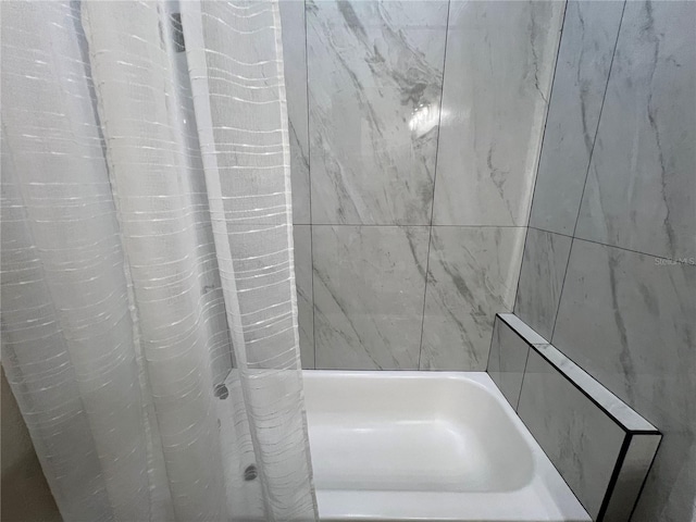 13430 NE 30th Ct, Anthony, FL 32617 - bathroom with a bathtub and a shower with curtain