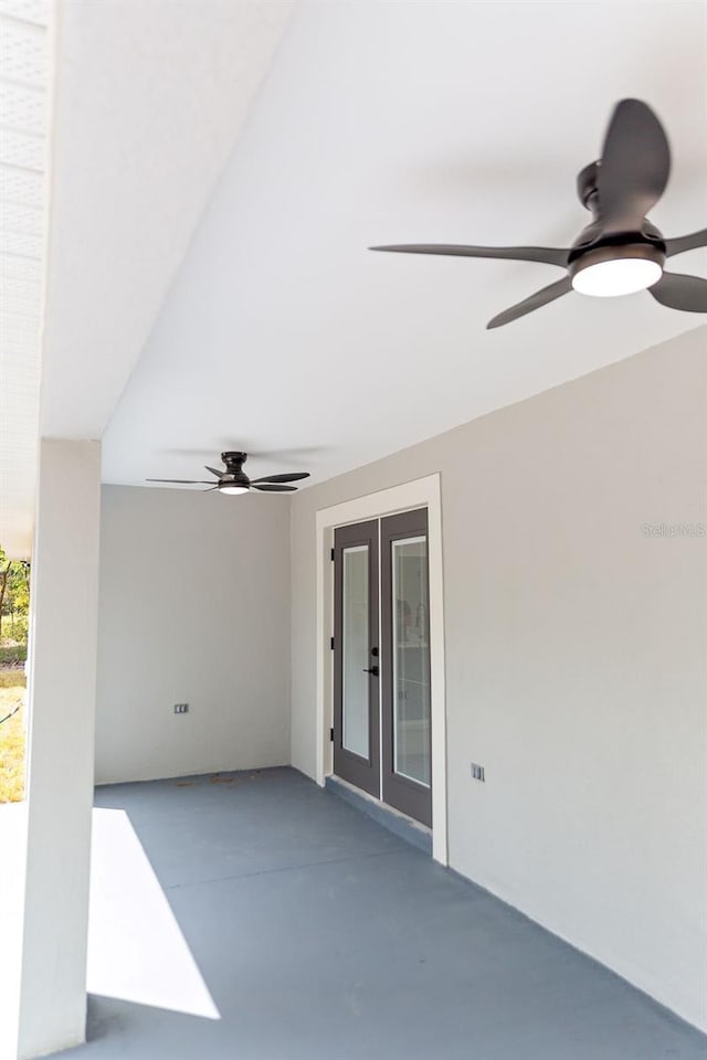 view of patio / terrace featuring french doors and ceiling fan