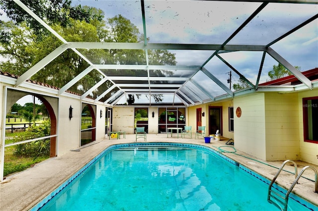 16850 SE 19th Ct, Summerfield, FL 34491 - swimming pool featuring a patio and a lanai