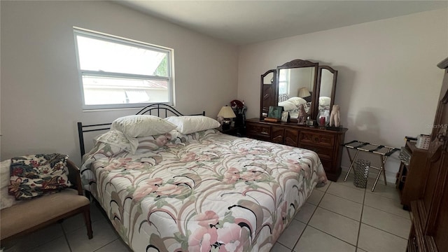 16850 SE 19th Ct, Summerfield, FL 34491 - bedroom with light tile patterned floors