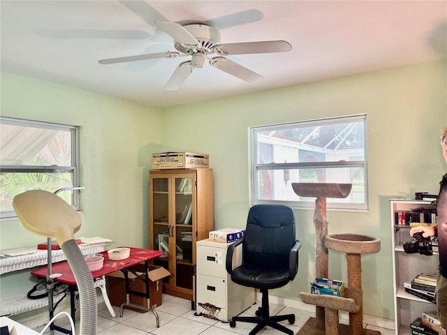 16850 SE 19th Ct, Summerfield, FL 34491 - home office featuring healthy amount of natural light, light tile patterned floors, and ceiling fan