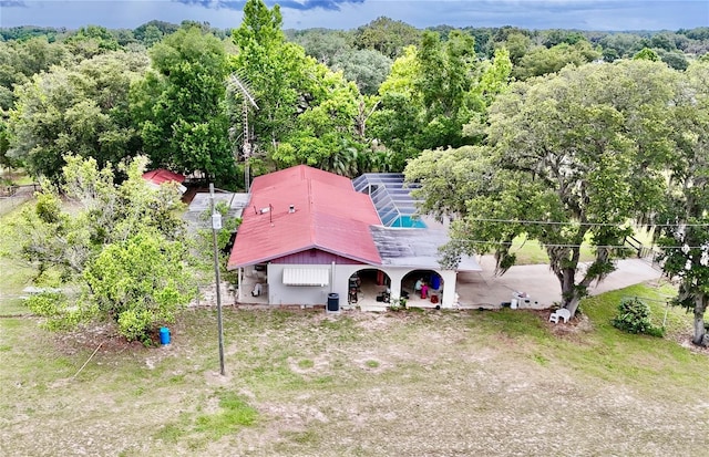 16850 SE 19th Ct, Summerfield, FL 34491 - view of subject property with a heavily wooded area