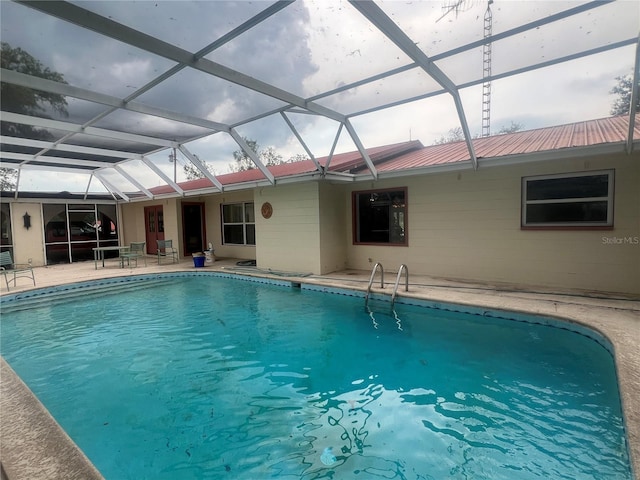 16850 SE 19th Ct, Summerfield, FL 34491 - swimming pool featuring a patio area and a lanai