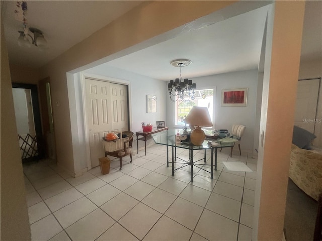 16850 SE 19th Ct, Summerfield, FL 34491 - dining space with a chandelier and light tile patterned flooring
