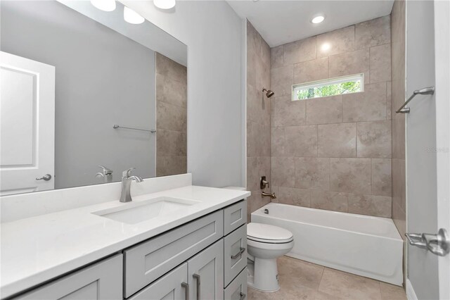 full bathroom with vanity, tub / shower combination, toilet, recessed lighting, and tile patterned floors