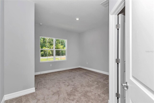 9405 SE 159th Ln, Summerfield, FL 34491 - unfurnished room with carpet flooring and baseboards