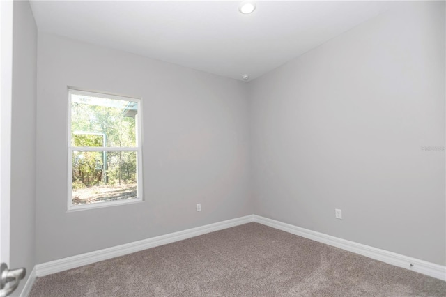 9405 SE 159th Ln, Summerfield, FL 34491 - empty room with carpet and baseboards