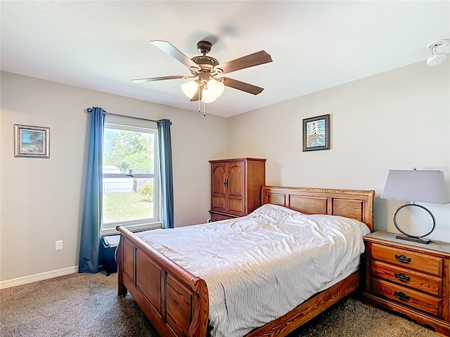 bedroom with carpet floors, baseboards, and ceiling fan