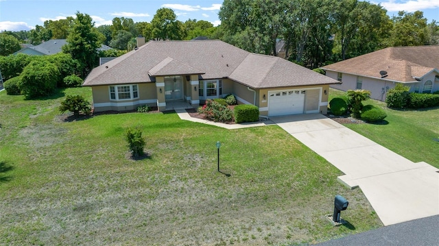 ranch-style home with a garage, a front yard, stucco siding, a chimney, and concrete driveway